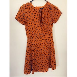 Orange with black flowers dress